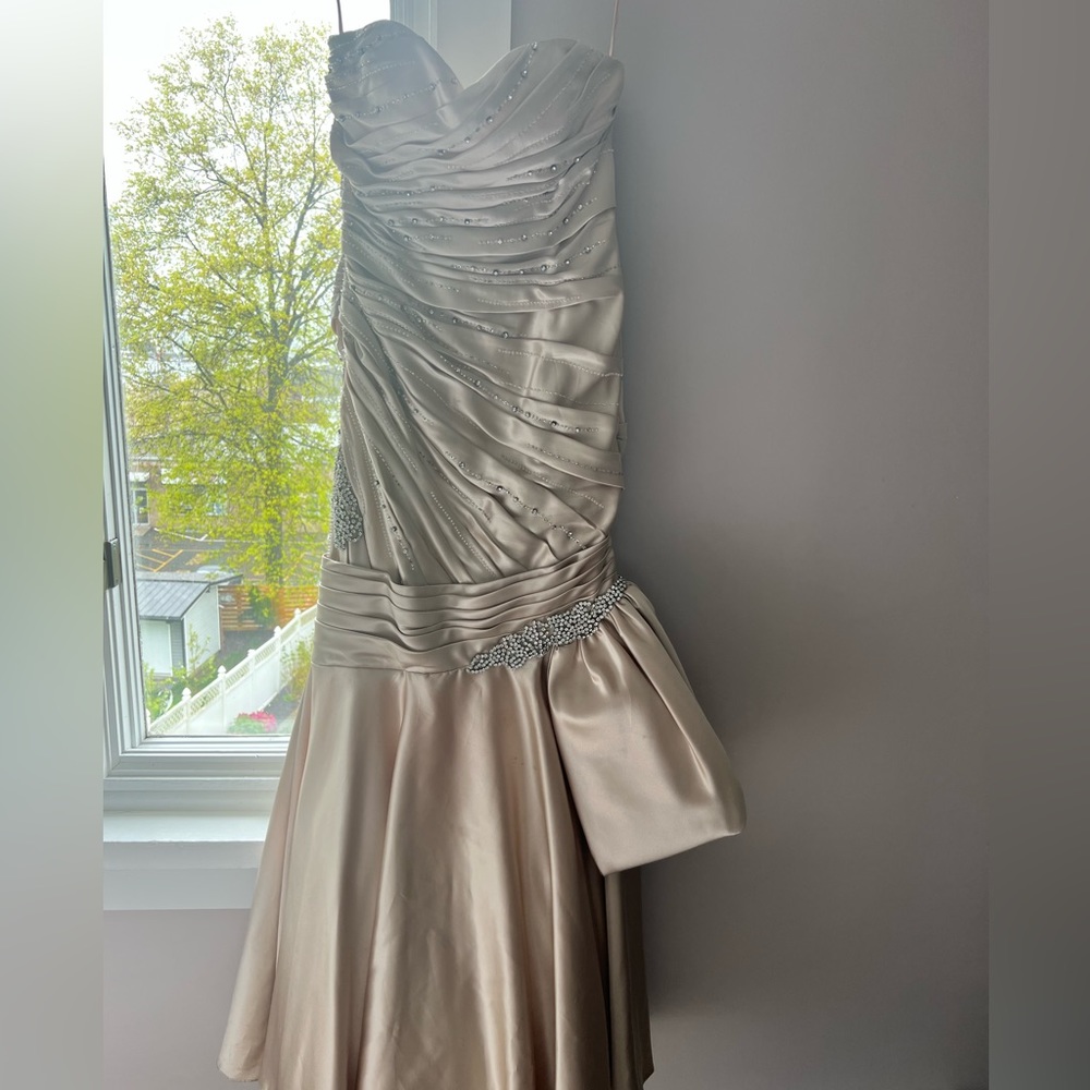 Jovani couture gown with rhinestone detailing. Only worn once.